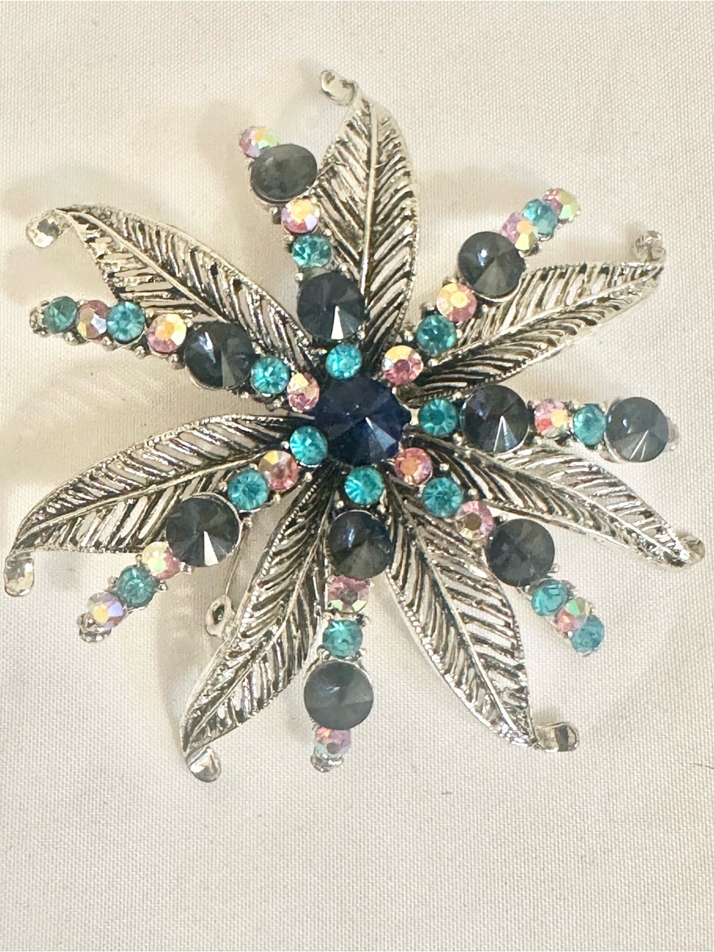 Fashion Jewelry Silver-Tone Leaf Burst Brooch with Teal, Navy, and Pink Stones